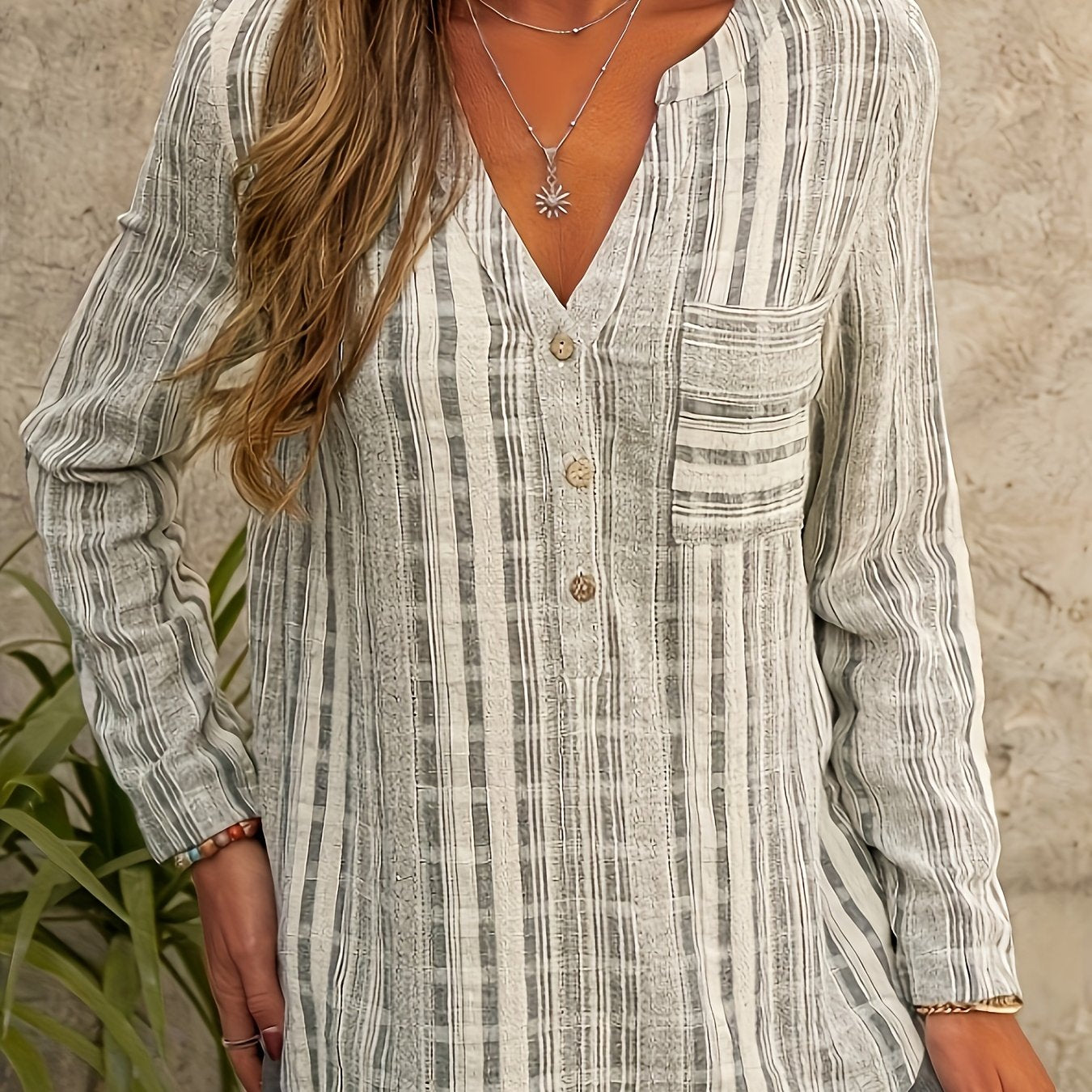 Bjørks™ | Stripete langermet bluse med knappelukking